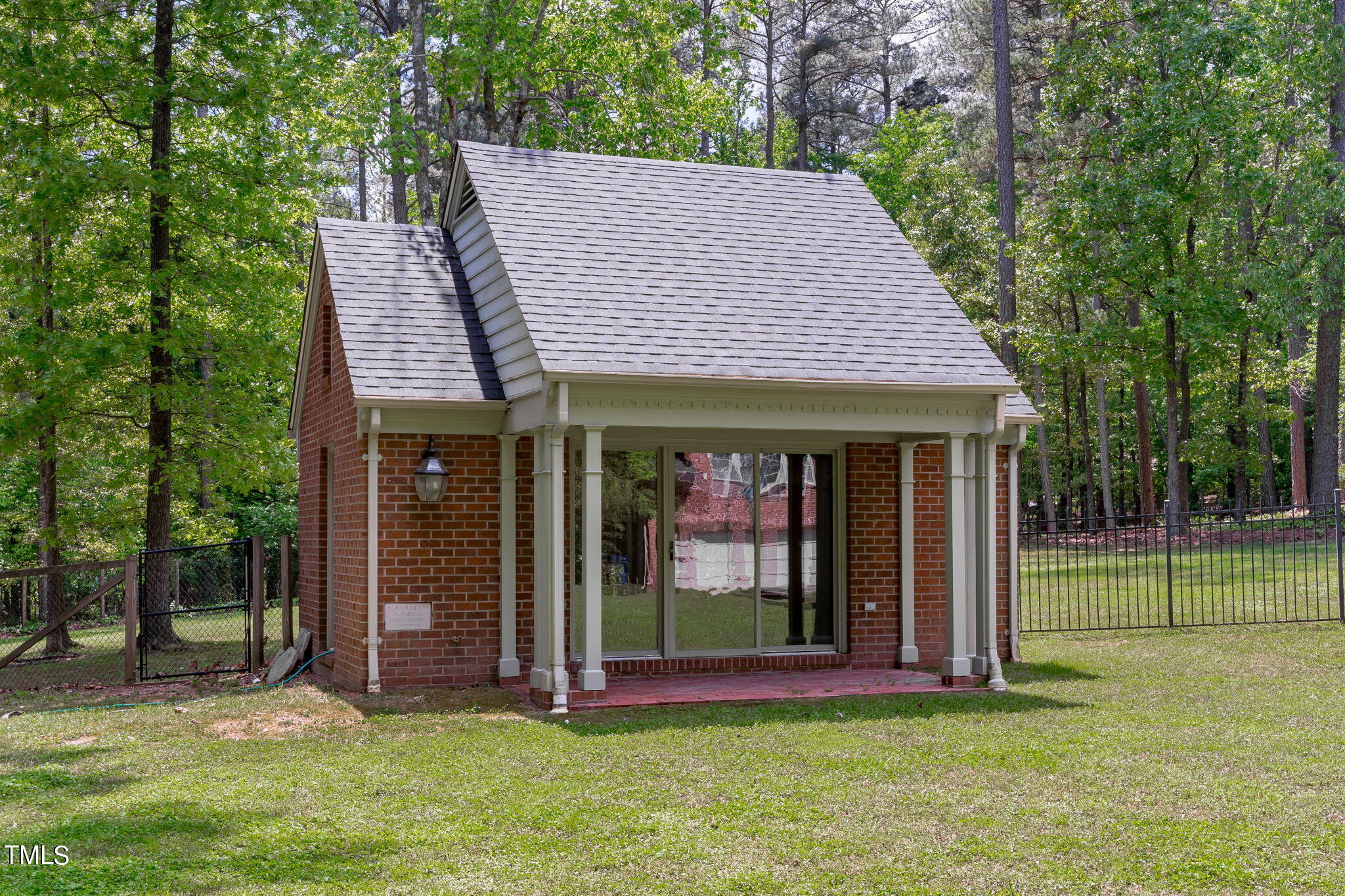3919 Regent Road Durham, NC 27707 - Photo 77 of 87 a view of a house with a yard and sitting area