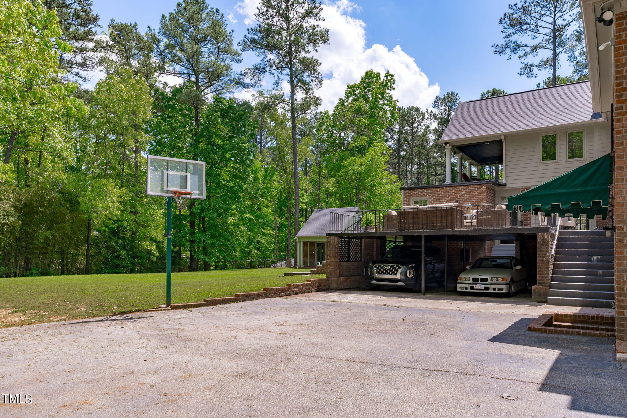 3919 Regent Road Durham, NC 27707 - Photo 81 of 87 a front view of a house with a yard and garage