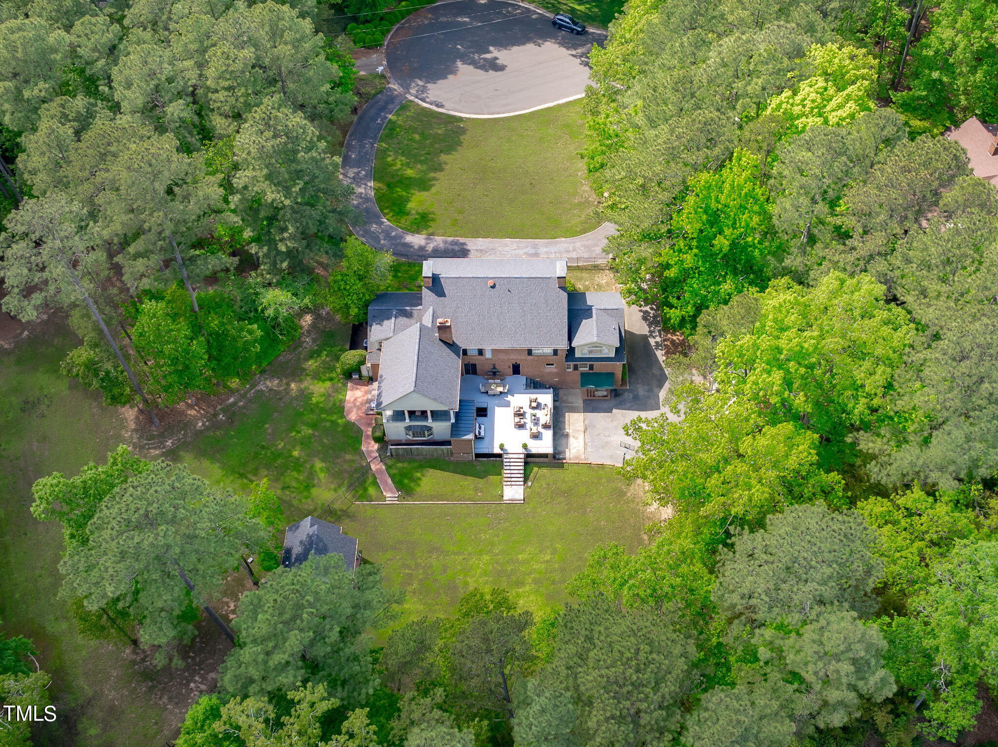 3919 Regent Road Durham, NC 27707 - Photo 86 of 87 an aerial view of a house with swimming pool and garden