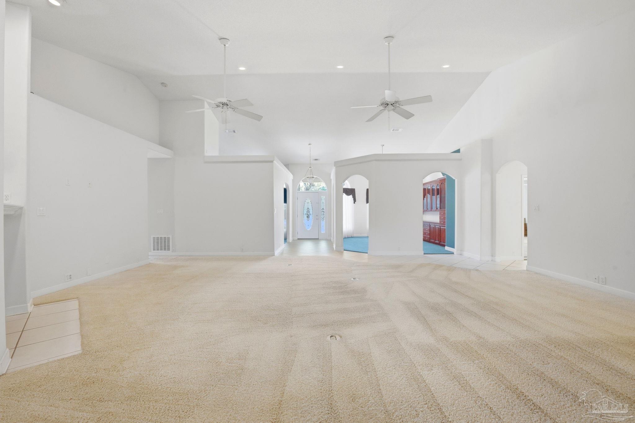 4552 Peaden Road Pace, FL 32571 - Photo 12 of 38 a view of empty room with ceiling fan