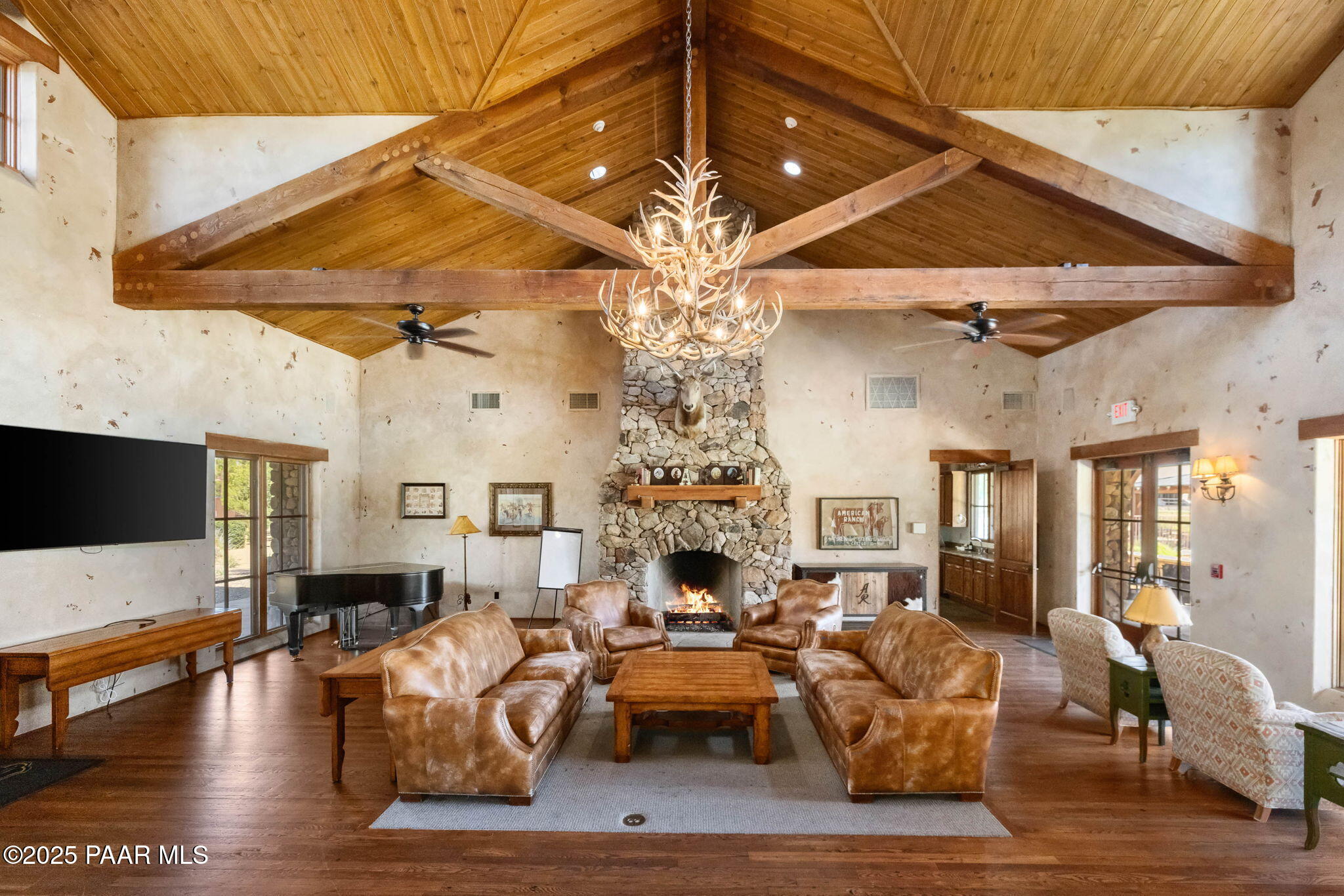 9515 North Equine Road Prescott, AZ 86305 - Photo 27 of 51 a living room with furniture and a chandelier