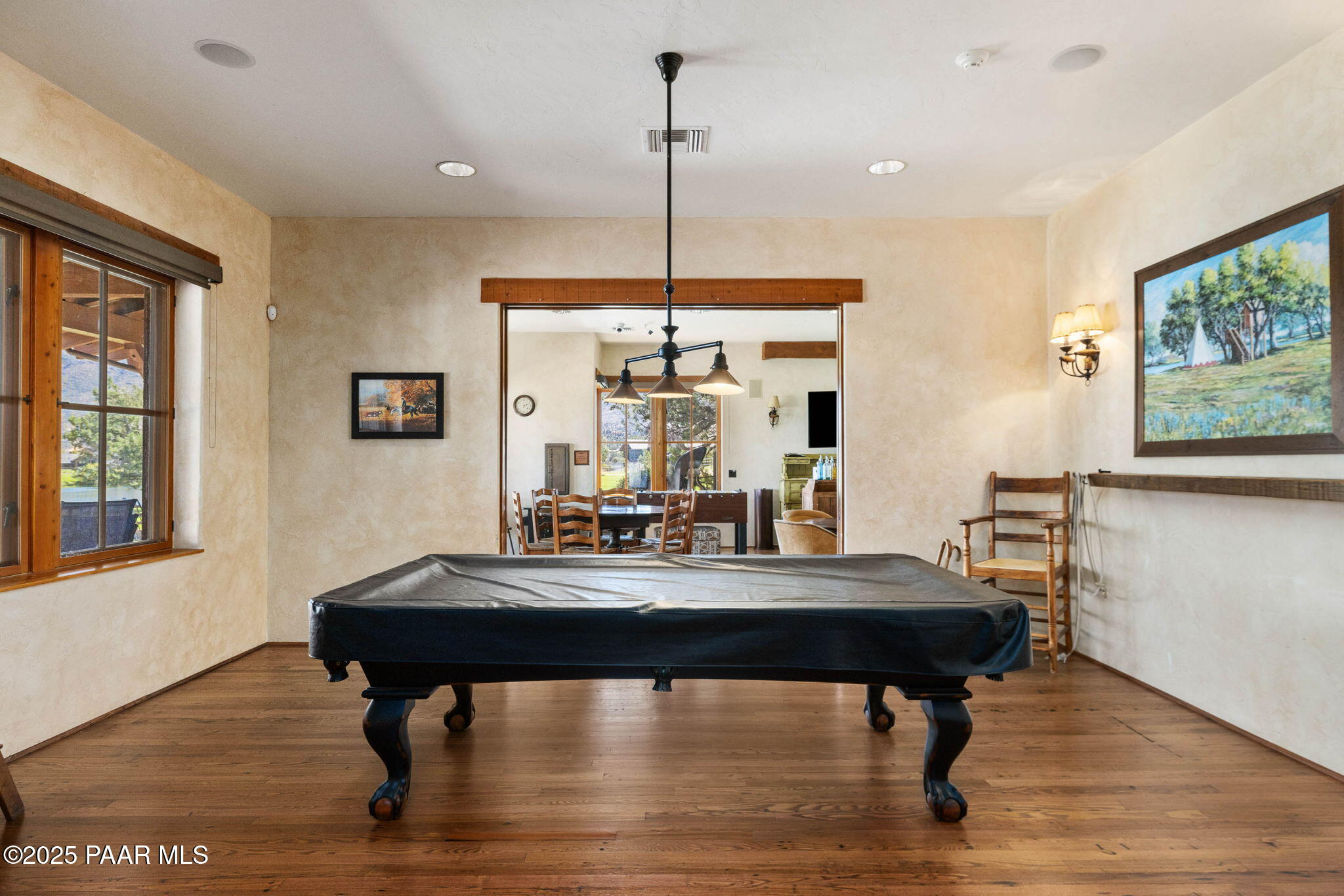 9515 North Equine Road Prescott, AZ 86305 - Photo 29 of 51 a room with furniture and a table