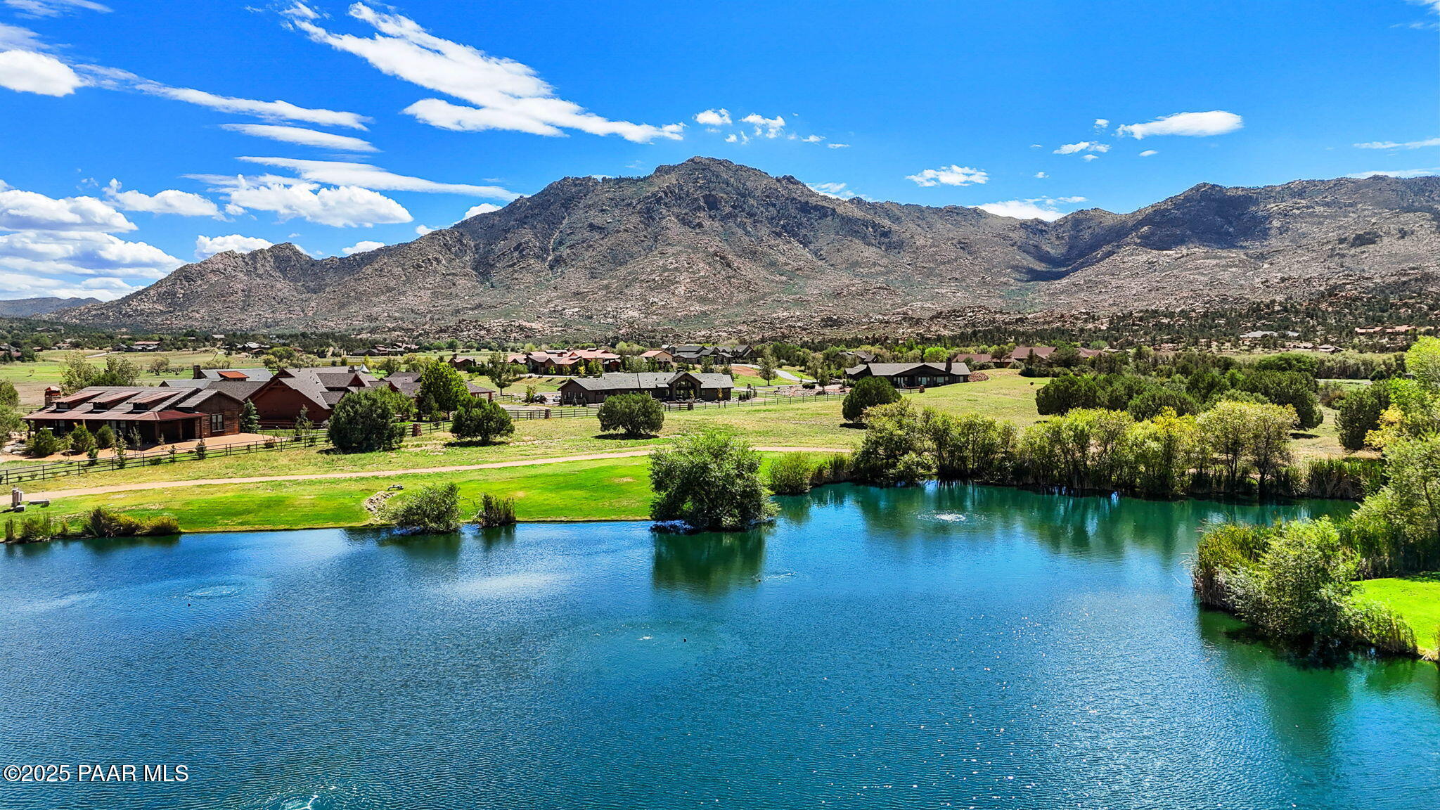 9515 North Equine Road Prescott, AZ 86305 - Photo 48 of 51 a view of a lake with houses