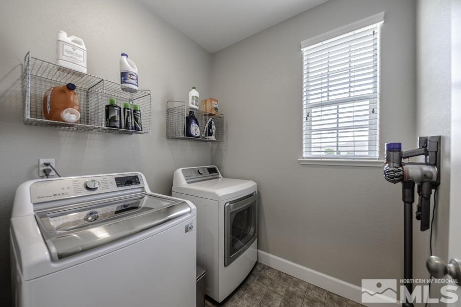 2029 Wind Ranch Road, Unit A Reno, NV 89521 - Photo 20 of 26 a utility room with dryer and washer