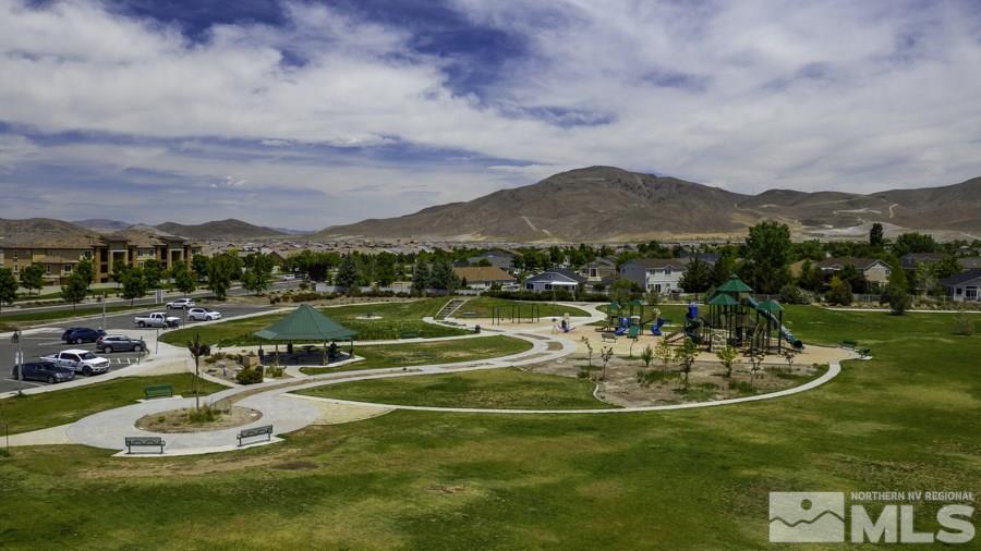 2029 Wind Ranch Road, Unit A Reno, NV 89521 - Photo 24 of 26 a view of a lake with a mountain in the background