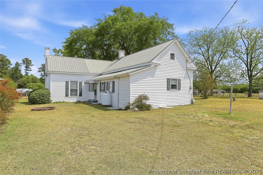 249 Nicholson Road Rockingham, NC 28379 - Photo 6 of 47 a view of a yard in front of a house