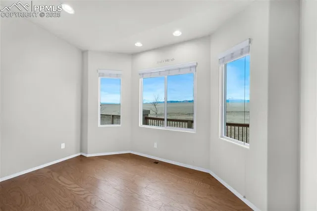 a kitchen with stainless steel appliances granite countertop a stove and a sink