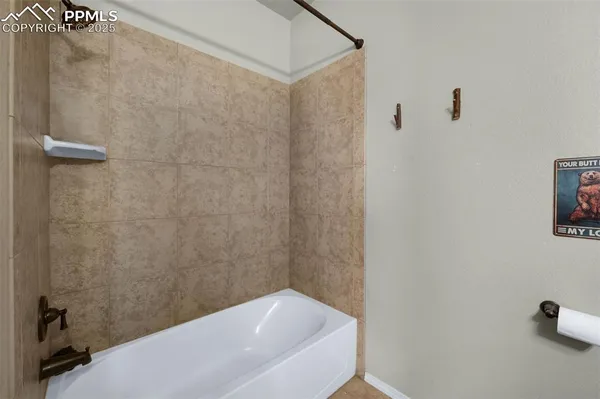 a view of an empty room with stairs