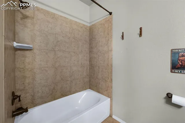 a view of an empty room with stairs