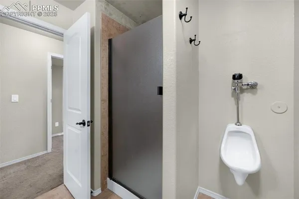 a view of a balcony with wooden floor