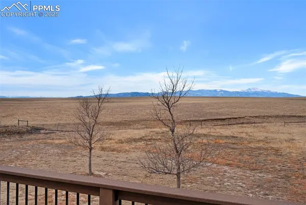 a front view of a house with parking area