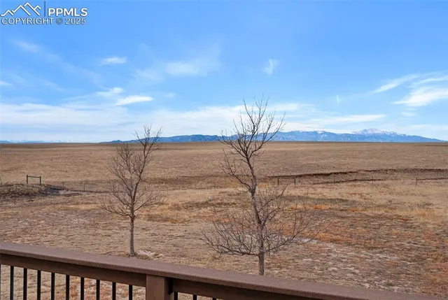 a front view of a house with parking area