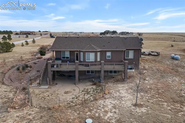a view of a terrace with a garden
