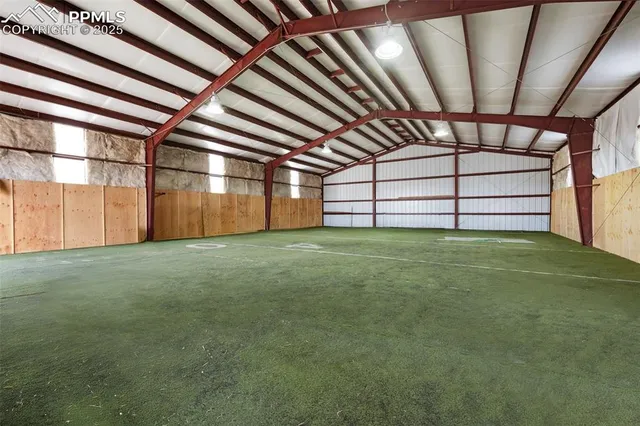 a view of a hallway with a kitchen