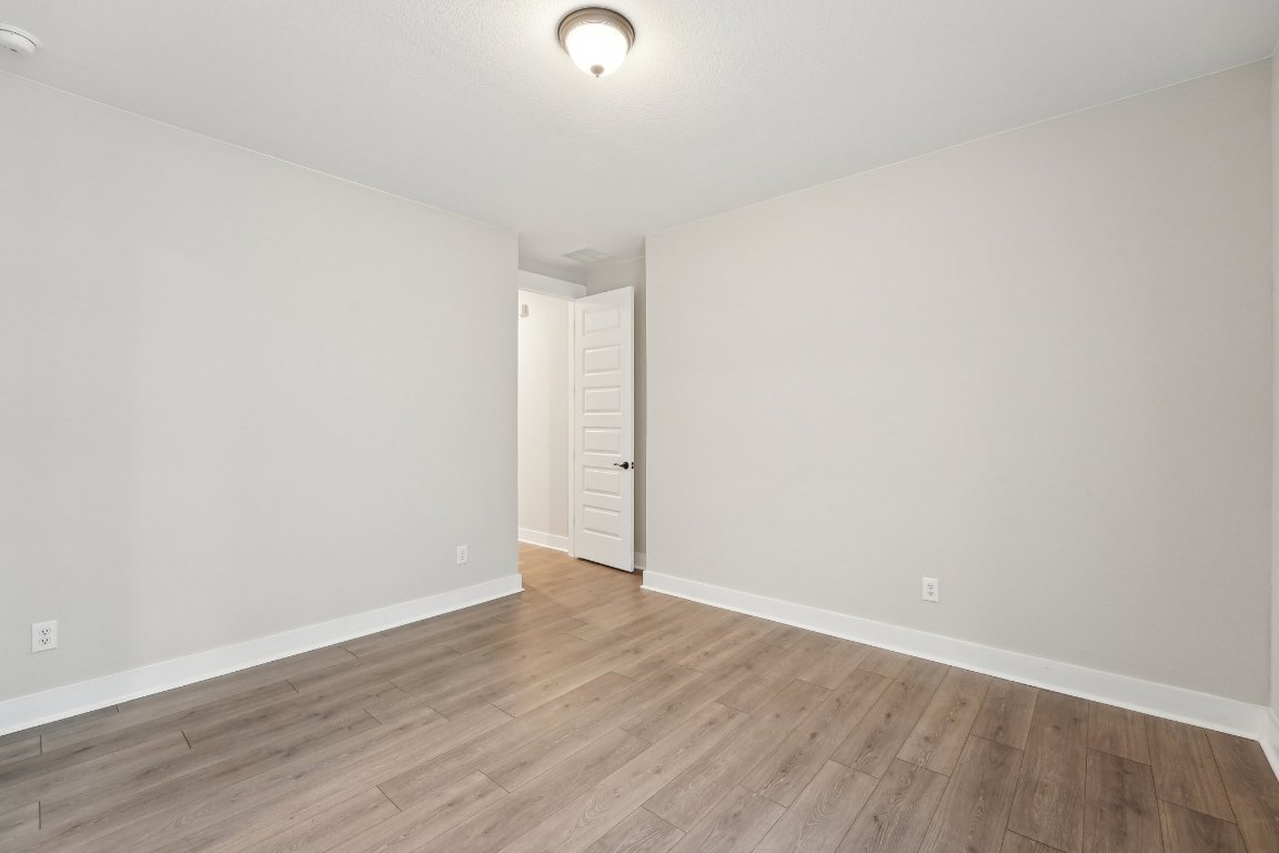 4216 Caroline Mae Cove Pflugerville, TX 78660 - Photo 17 of 32 a view of an empty room
