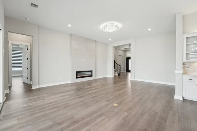 a view of a livingroom with wooden floor