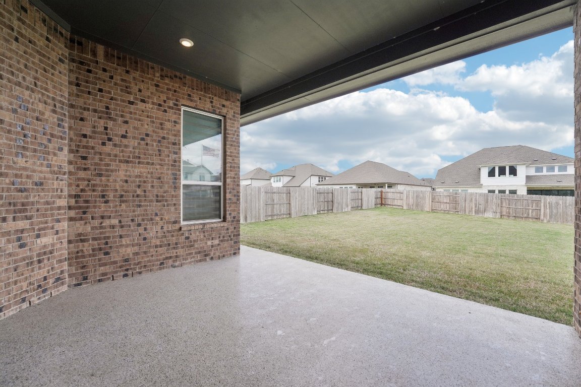 4216 Caroline Mae Cove Pflugerville, TX 78660 - Photo 31 of 32 a view of outdoor space and yard