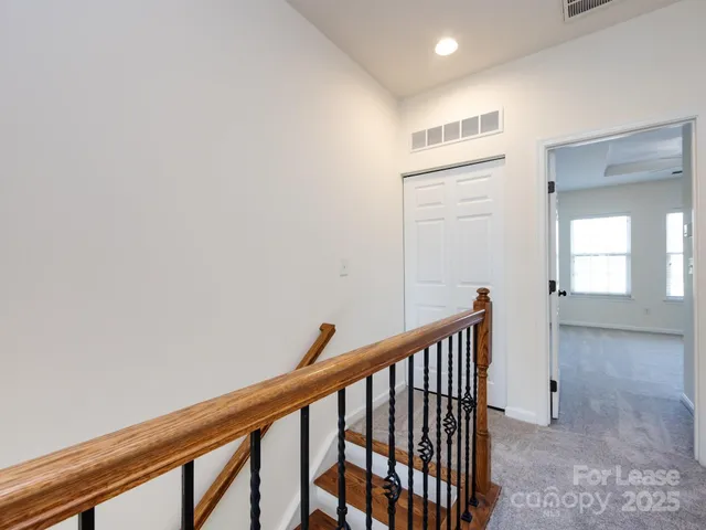 a view of a hallway with entryway