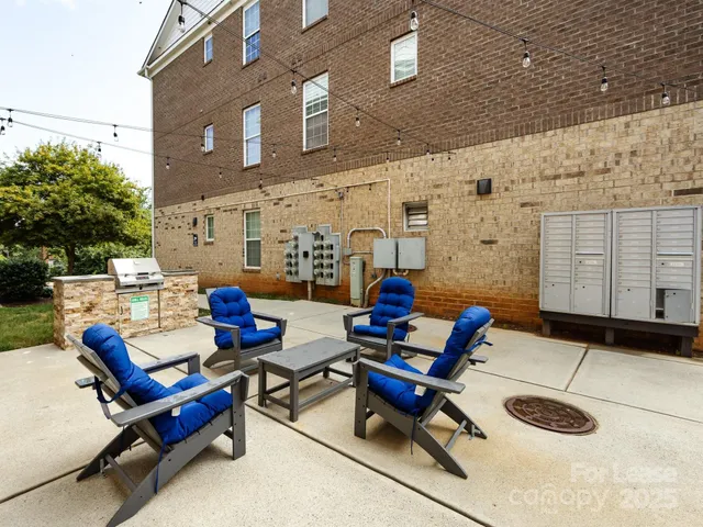 a building outdoor space with patio furniture