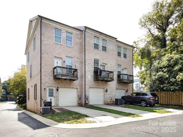 a car parked in front of a house