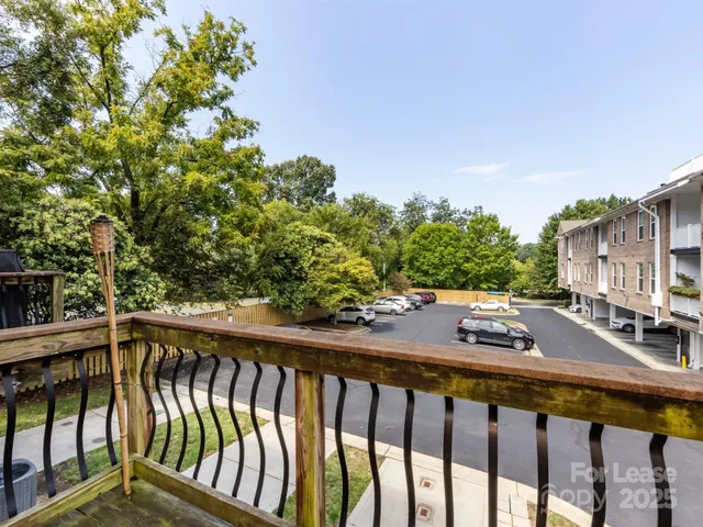a view of balcony with furniture