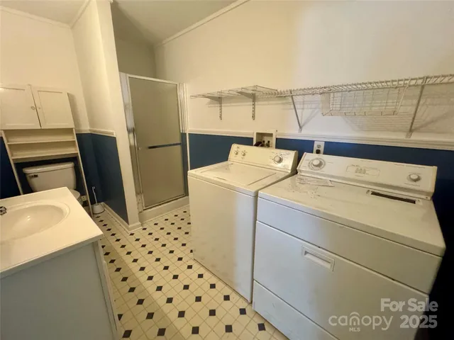 a utility room with dryer and washer