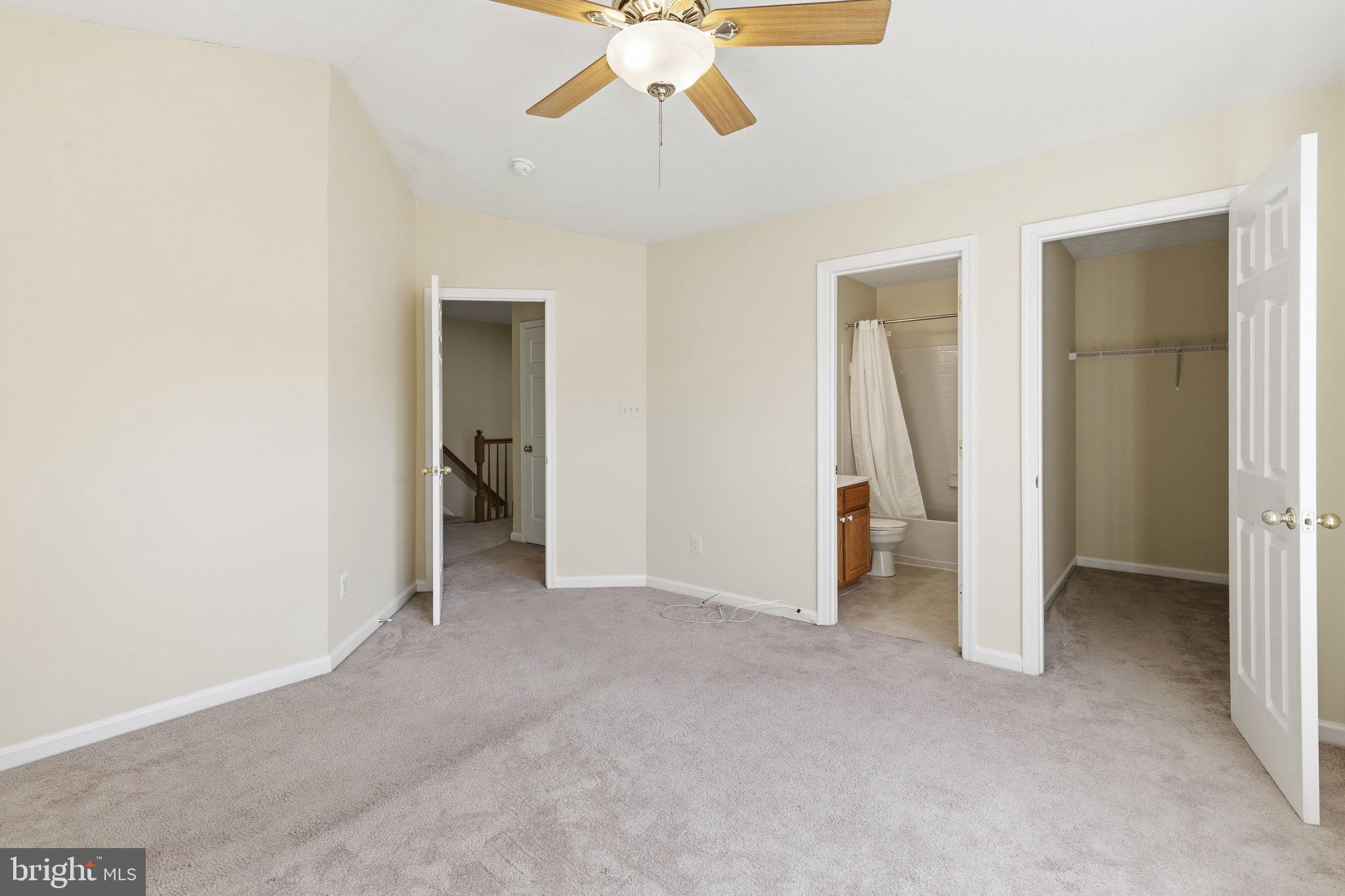 2801 Profitt Path Edgewood, MD 21040 - Photo 10 of 32 an empty room with closet and a chandelier fan