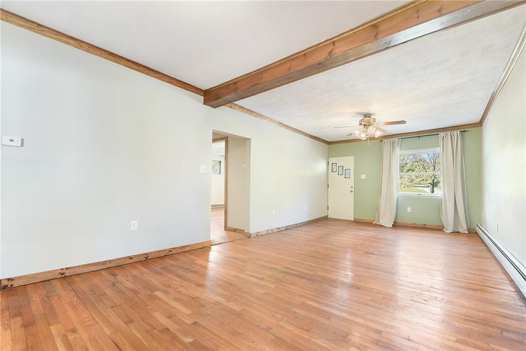 1190 Rte 481 Charleroi, PA 15022 - Photo 14 of 32 a view of empty room with wooden floor