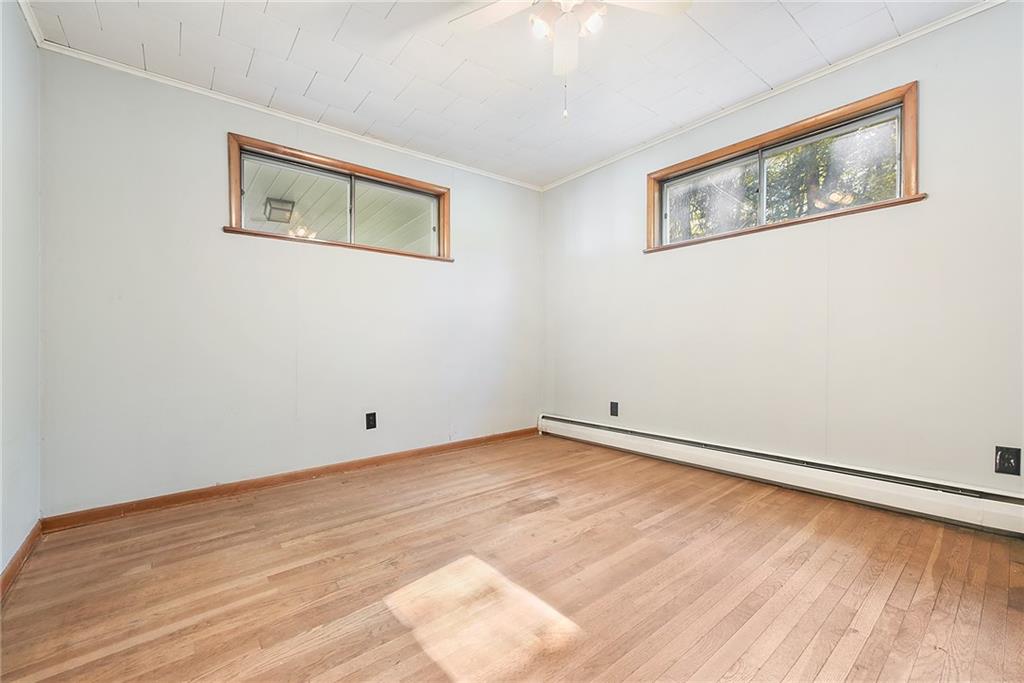 1190 Rte 481 Charleroi, PA 15022 - Photo 15 of 32 a view of empty room with wooden floor