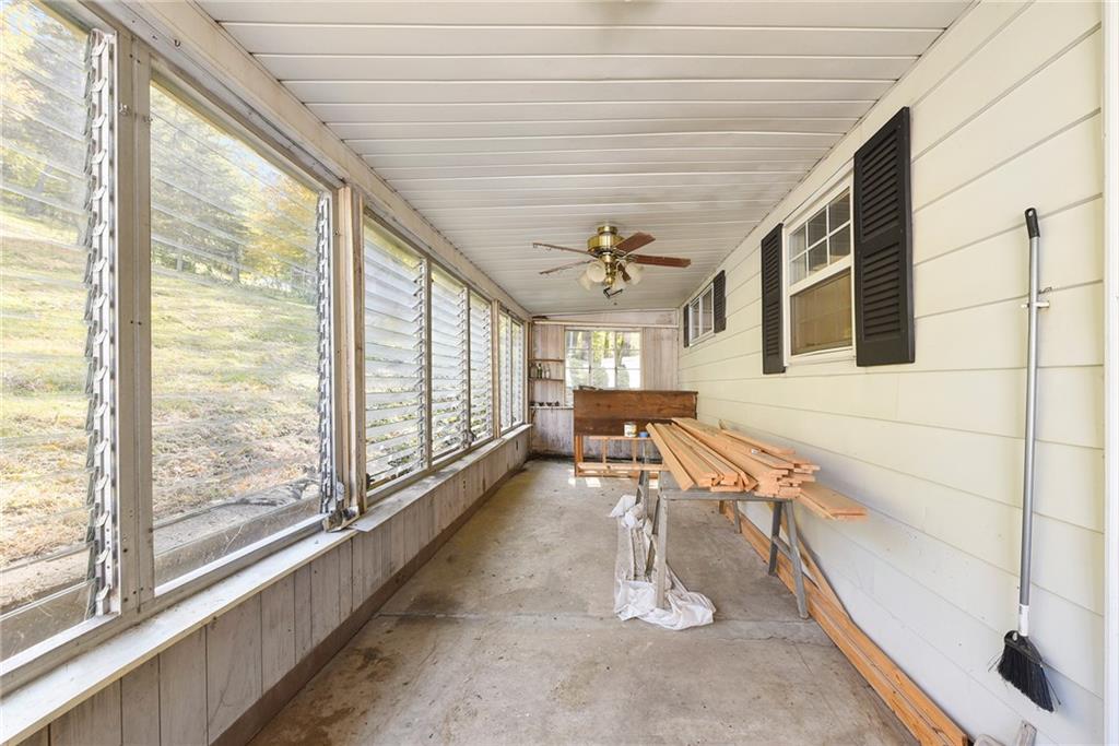 1190 Rte 481 Charleroi, PA 15022 - Photo 19 of 32 a balcony with furniture and a large window