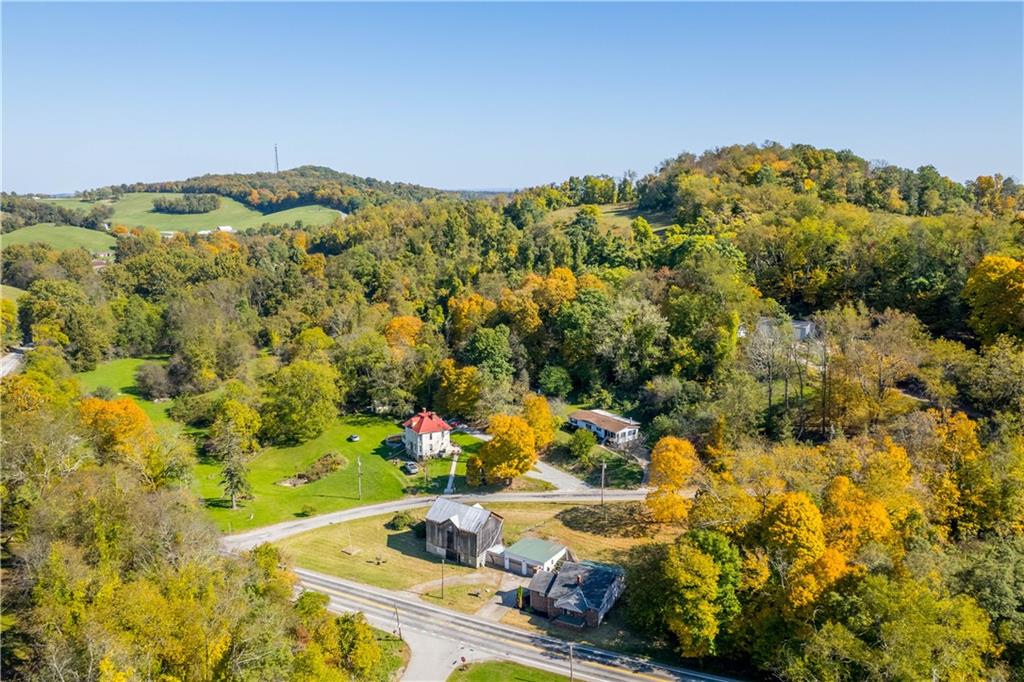 1190 Rte 481 Charleroi, PA 15022 - Photo 2 of 32 a view of a garden with a building in the background