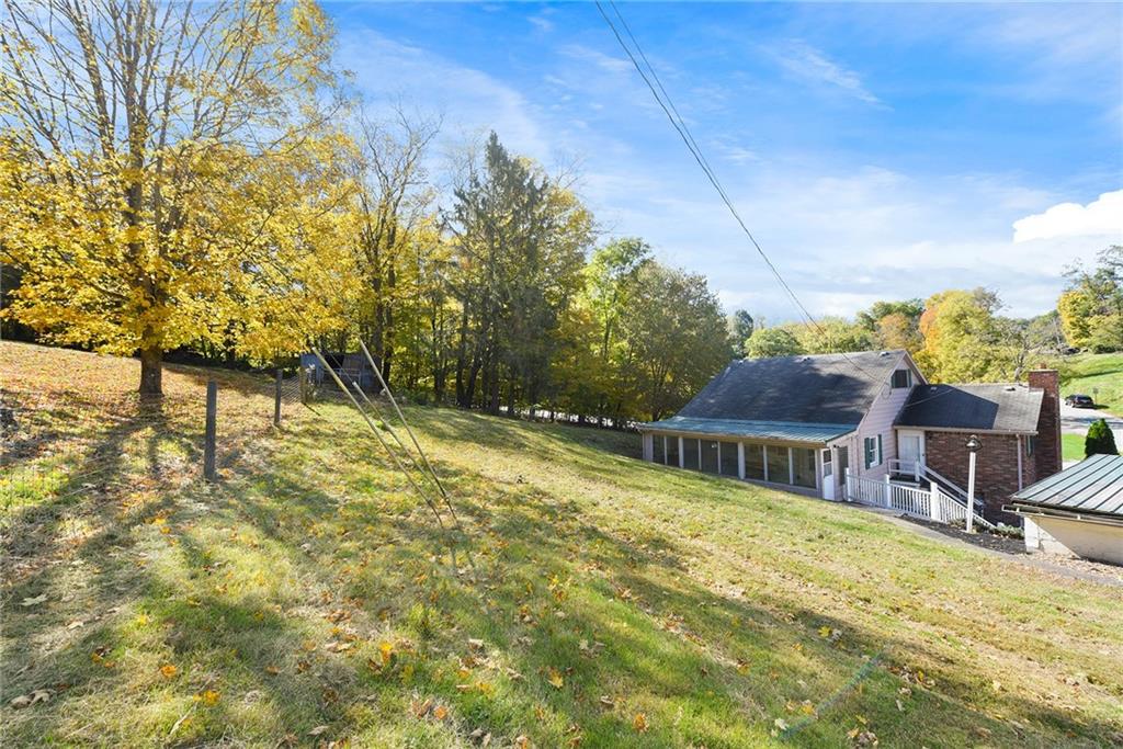 1190 Rte 481 Charleroi, PA 15022 - Photo 22 of 32 a swimming pool with outdoor seating and yard