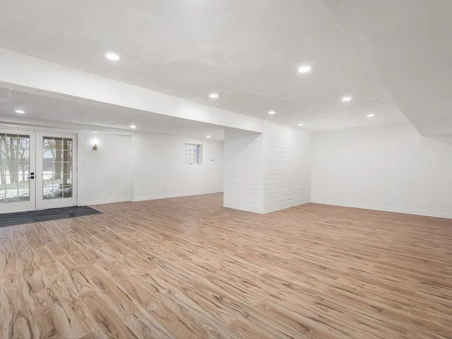 an aerial view of a houses with a yard