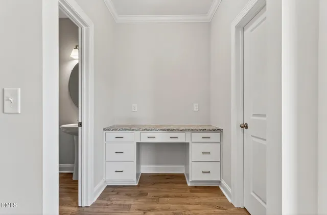 a view of a hallway with closet