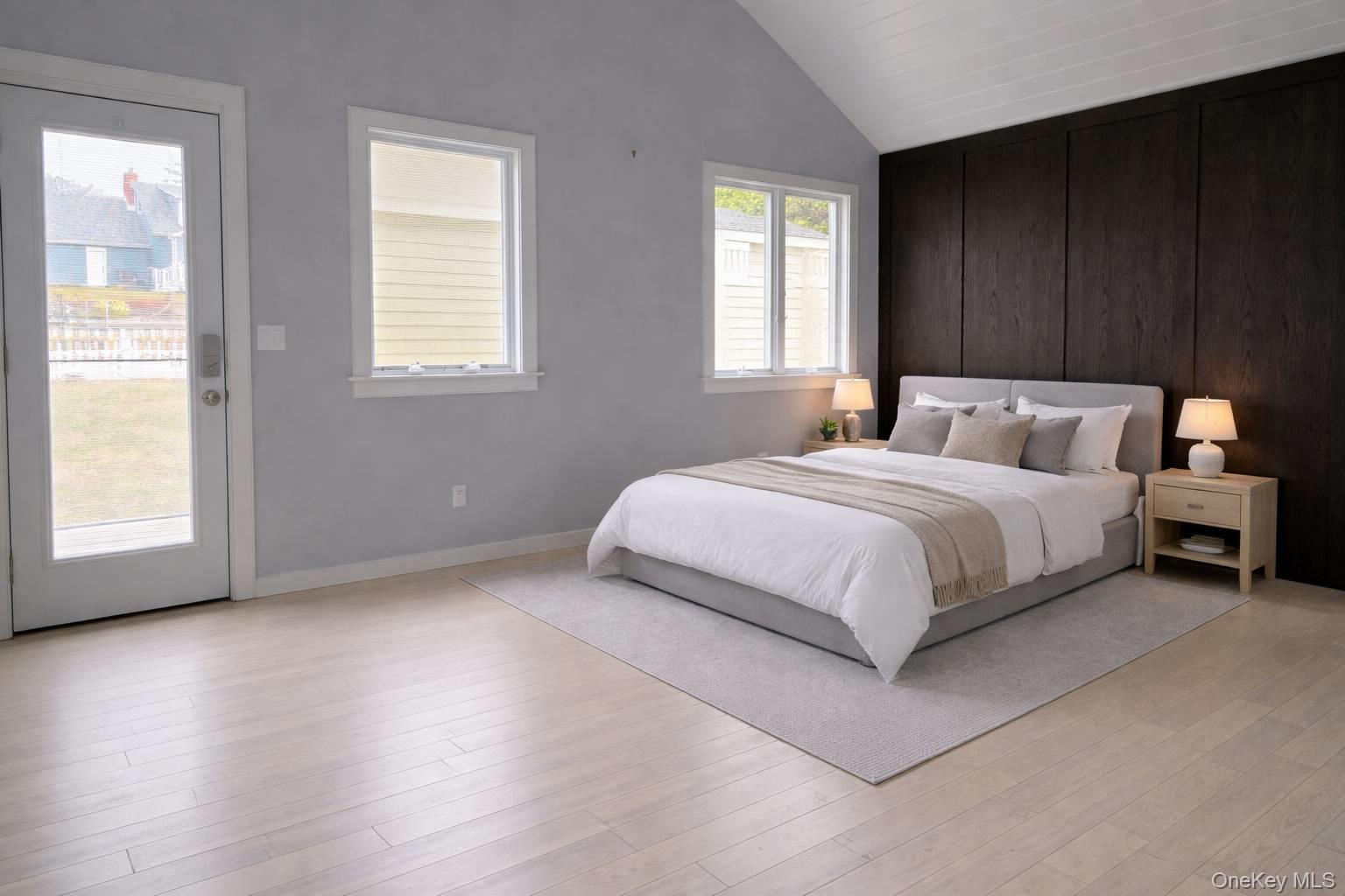 21 Tarpon Road East Quogue, NY 11942 - Photo 11 of 18 a bedroom with a bed and a window