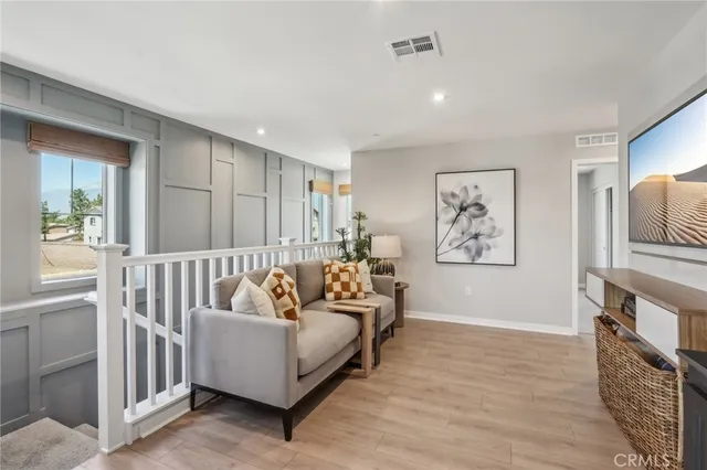a living room with furniture and a couch