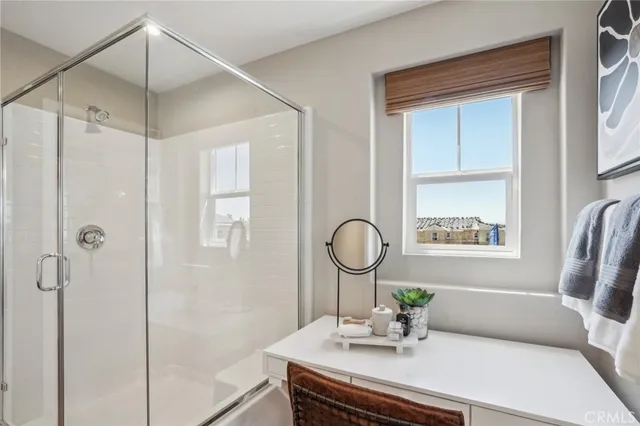a dining room with a table and chairs