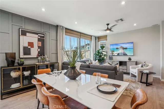 a kitchen with kitchen island granite countertop a sink a center island and cabinets