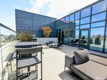 a view of a terrace with seating area