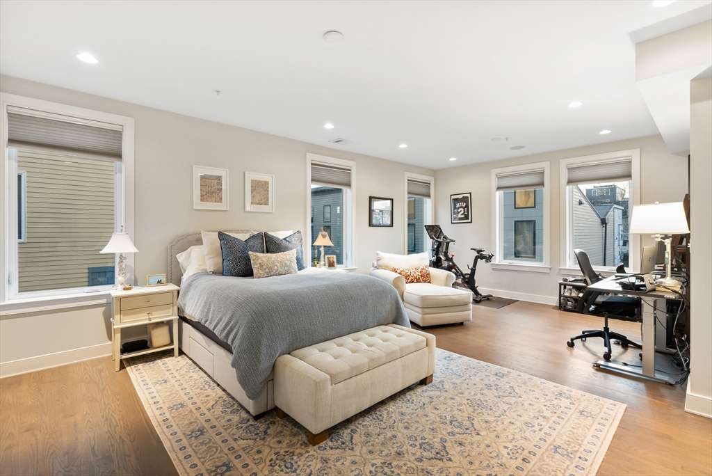 405 West First Street, Unit 303 Boston, MA 02127 - Photo 13 of 29 a living room with furniture and a large window