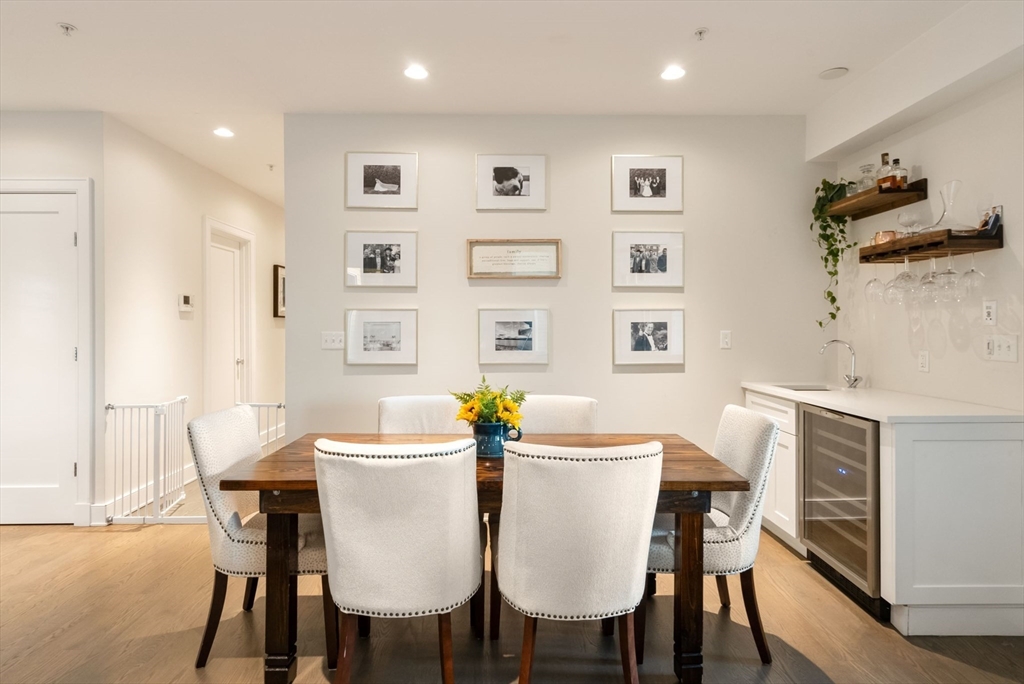 405 West First Street, Unit 303 Boston, MA 02127 - Photo 8 of 29 a dining room with furniture and window