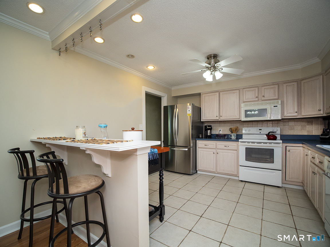 82 Wilcox Road Middletown, CT 06457 - Photo 19 of 27 a kitchen with a sink cabinets and counter space