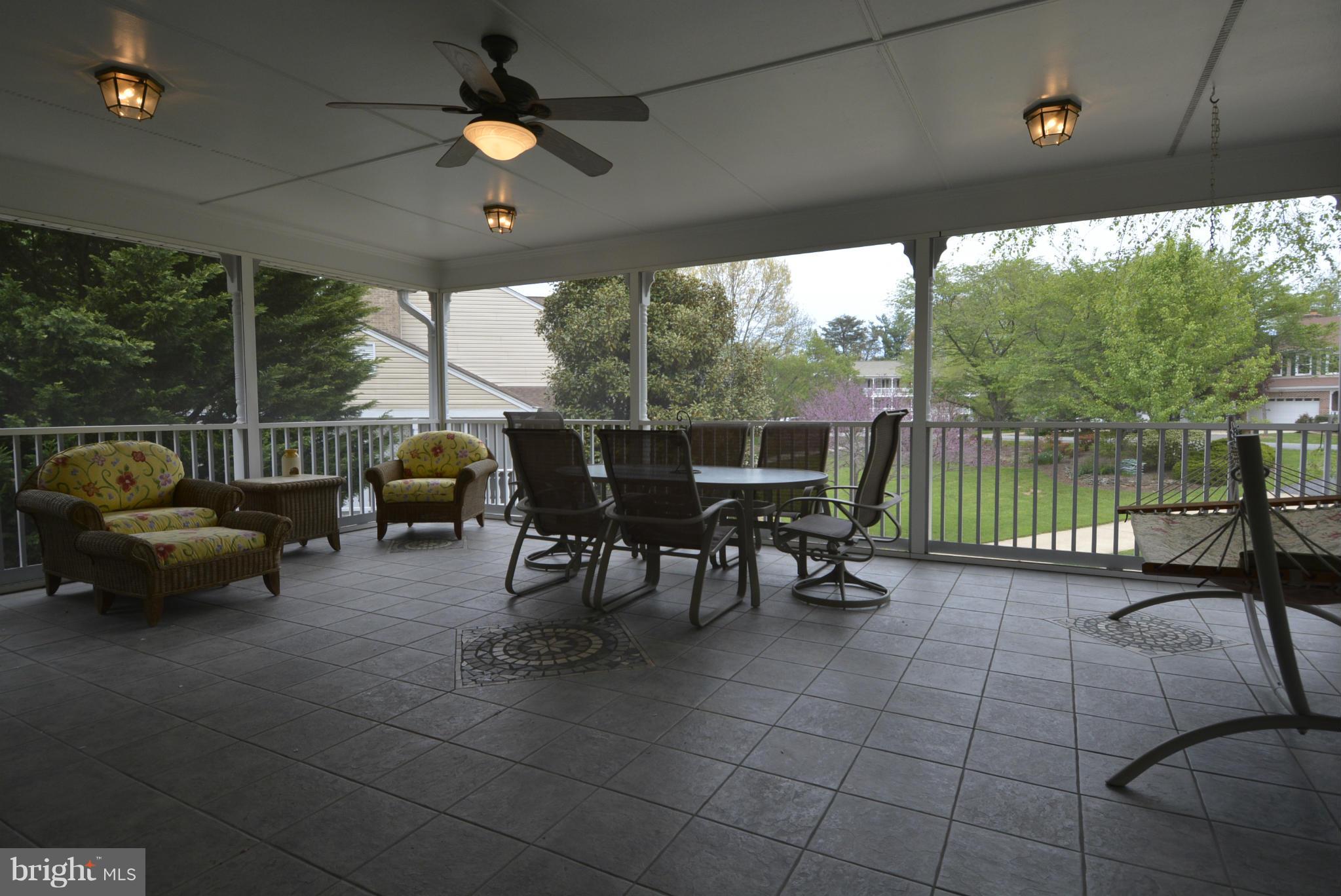 2810 Rifle Ridge Road Oakton, VA 22124 - Photo 18 of 30 Enormous Screened Porch w Ceramic Tile Flooring