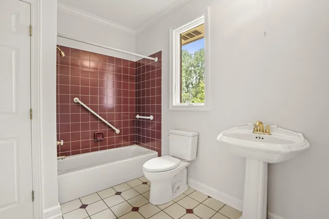 a large bathroom with a granite countertop tub a sink shower and a mirror