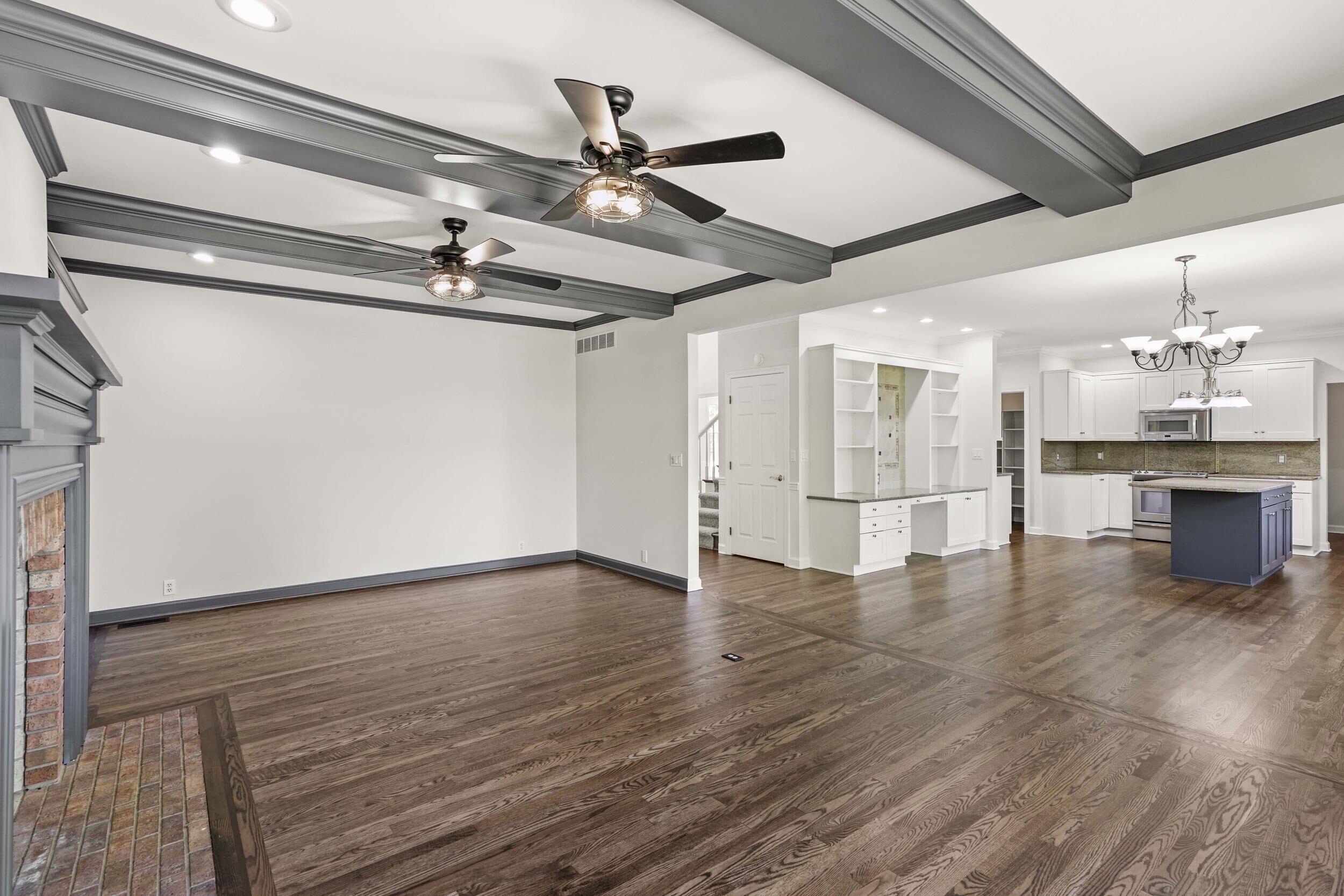 1500 Nelson Drive Chesterton, IN 46304 - Photo 25 of 70 a view of a livingroom with a ceiling fan wooden floor and a ceiling fan