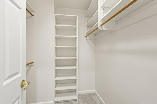 a kitchen with a sink cabinets and window