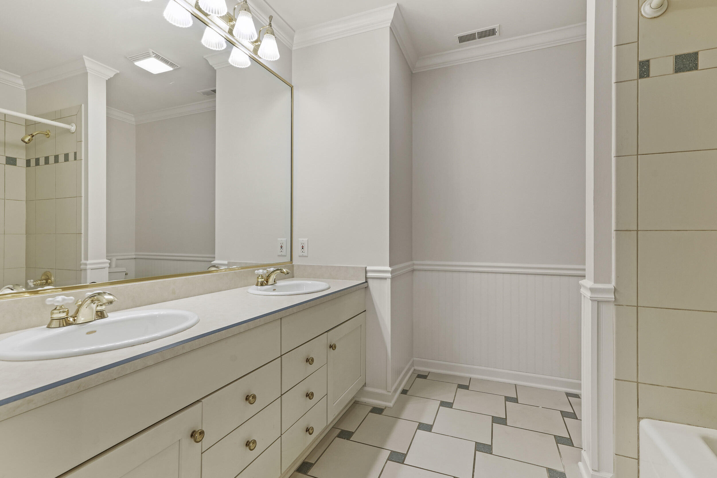 1500 Nelson Drive Chesterton, IN 46304 - Photo 44 of 70 a bathroom with a double vanity sink mirror and double