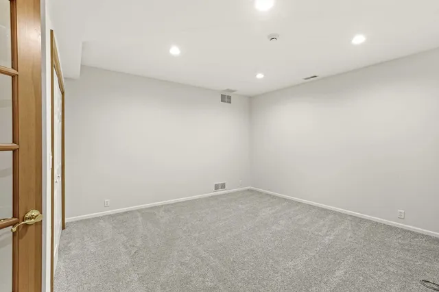 an aerial view of a house with yard swimming pool and outdoor seating