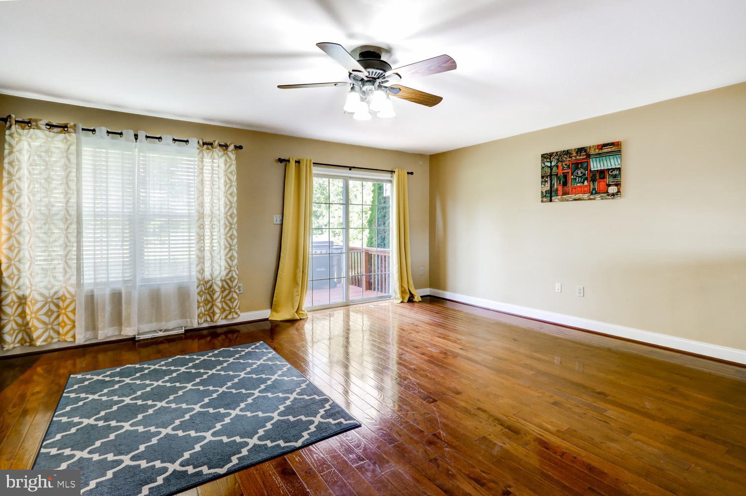 1006 Cobblestone Lane Lancaster, PA 17601 - Photo 18 of 38 an empty room with wooden floor and windows