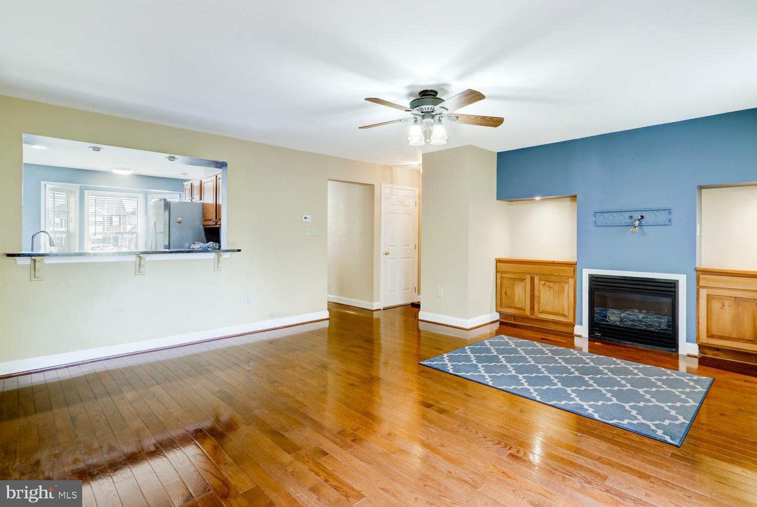1006 Cobblestone Lane Lancaster, PA 17601 - Photo 19 of 38 a view of an empty room with a fireplace and a window
